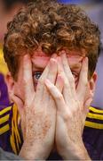 28 July 2019; A Wexford supporter watches the closing moments of the GAA Hurling All-Ireland Senior Championship Semi Final match between Wexford and Tipperary at Croke Park in Dublin. Photo by Brendan Moran/Sportsfile