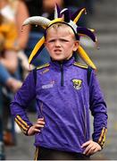 28 July 2019; A young Wexford supporter watches the closing moments of the GAA Hurling All-Ireland Senior Championship Semi Final match between Wexford and Tipperary at Croke Park in Dublin. Photo by Brendan Moran/Sportsfile
