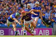 28 July 2019; Lee Chin of Wexford is dispossessed by Cathal Barrett of Tipperary during the GAA Hurling All-Ireland Senior Championship Semi Final match between Wexford and Tipperary at Croke Park in Dublin. Photo by Brendan Moran/Sportsfile