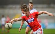 28 July 2019; Patrick Campbell of Cork in action against Cian Maguire of Monaghan during the Electric Ireland GAA Football All-Ireland Minor Championship Quarter-Final match between Monghan and Cork at Bord Na Mona O'Connor Park in Tullamore, Offaly. Photo by David Fitzgerald/Sportsfile