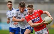 28 July 2019; Patrick Campbell of Cork in action against Cian Maguire of Monaghan during the Electric Ireland GAA Football All-Ireland Minor Championship Quarter-Final match between Monghan and Cork at Bord Na Mona O'Connor Park in Tullamore, Offaly. Photo by David Fitzgerald/Sportsfile