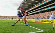 28 July 2019; Paul Morris of Wexford puts the sliotar through the legs of Cathal Barrett of Tipperary before going on to score a point during the GAA Hurling All-Ireland Senior Championship Semi Final match between Wexford and Tipperary at Croke Park in Dublin. Photo by Brendan Moran/Sportsfile