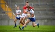 28 July 2019; Conor McKernan of Monaghan in action against Michael O'Neill of Cork during the Electric Ireland GAA Football All-Ireland Minor Championship Quarter-Final match between Monghan and Cork at Bord Na Mona O'Connor Park in Tullamore, Offaly. Photo by David Fitzgerald/Sportsfile