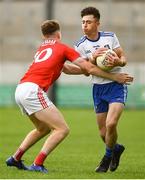 28 July 2019; Shane Slevin of Monaghan in action against Hugh Murphy of Cork during the Electric Ireland GAA Football All-Ireland Minor Championship Quarter-Final match between Monghan and Cork at Bord Na Mona O'Connor Park in Tullamore, Offaly. Photo by David Fitzgerald/Sportsfile