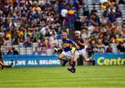 28 July 2019; Ewan Tynan, St Mary’s NS, Ballygunner, Waterford, representing Tipperary, and Harry Curley, Scoil Mhuire Marino, Grifth Avenue, Dublin, representing Wexford, during the INTO Cumann na mBunscol GAA Respect Exhibition Go Games at the GAA Hurling All-Ireland Senior Championship Semi Final match between Wexford and Tipperary at Croke Park in Dublin. Photo by Ray McManus/Sportsfile