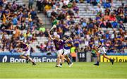 28 July 2019; Tomás O'Shea, Lisvernane NS, Aherlow, Tipperary, representing Tipperary, and Harry Curley, Scoil Mhuire Marino, Grifth Avenue, Dublin, representing Wexford, during the INTO Cumann na mBunscol GAA Respect Exhibition Go Games at the GAA Hurling All-Ireland Senior Championship Semi Final match between Wexford and Tipperary at Croke Park in Dublin. Photo by Ray McManus/Sportsfile