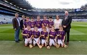 28 July 2019; Uachtarán Chumann Lúthchleas Gael John Horan with the Wexford team, back row, left to right, Harry Curley, Scoil Mhuire Marino, Grifth Avenue, Dublin, Matthew O'Neill, Carnaun NS, Athenry, Galway, Carl McCormack, Scoil Mhuire, Loughegar, Mullingar, Westmeath, Ciaran King, St Kevin’s NS, Dunleer, Louth, Shane Reddy, Rathnure NS, Enniscorthy , Wexford, front row, left to right, James Cully, Kildalkey NS, Kildalkey, Meath, Dan O'Connor, St Mary’s PS, Bellanaleck, Fermanagh, Kyle Nolan, Borris NS, Borris, Carlow, Cian Maguire, Scoil Eoin Bosco, Navan Rd, Dublin, Daithí McCloskey, St Canice PS, Dungiven, Derry, ahead of the INTO Cumann na mBunscol GAA Respect Exhibition Go Games at the GAA Hurling All-Ireland Senior Championship Semi Final match between Wexford and Tipperary at Croke Park in Dublin. Photo by Daire Brennan/Sportsfile