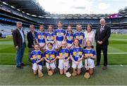 28 July 2019; Uachtarán Chumann Lúthchleas Gael John Horan, with the Tipperary team, back row, left to right, Mary McArthur, St Olcan’s PS, Armoy, Antrim, Aisling Hannan, St Senan’s Clonlara, Clonlara, Clare, Róisín Quinn, Scoil Treasa Naofa, Kilfynn, Kerry, Emma Kennedy Ballygarvan NS, Ballygarvan, Cork, Laura Flanagan, Tooreen NS, Ballyhaunis, Mayo, front row, back to right, Zara Kelly, St. Patrick’s PS, Hilltown, Down, Catríona McKinney, St Mura’s NS, Burnfoot, Donegal, Eimear Mallon, St John’s PS, Middletown, Armagh, Aoife Murphy, Clarecastle NS, Clarecastle, Clare, Deirbhile O’Carroll, Knocklong NS, Knocklong, Limerick, ahead of the INTO Cumann na mBunscol GAA Respect Exhibition Go Games at the GAA Hurling All-Ireland Senior Championship Semi Final match between Wexford and Tipperary at Croke Park in Dublin. Photo by Daire Brennan/Sportsfile