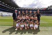 27 July 2019; INTO Mini-Games Co-ordinator Gerry O'Meara, with the Kilkenny team, back row, left to right, Alannah Firman, Murrintown NS, Murrintown, Wexford, Sinéad Oltean, Scoil Áine Naofa, Esker, Lucan, Dublin, Saoirse McMahon, St Colmcilles SNS, Knocklyon, Dublin, Meabh Rouse, Gaelscoil an Eiscir Riada, Tullamore, Co Offaly, Róisín Kinsella, Mercy Primary School, Birr, Offaly, front row, left to right, Emer Conroy, The Rock NS, The Rock, Mountmellick, Laois, Amy O’Mara, St Laurence’s NS, Crookstown, Kildare, Pia Langton, Clara NS, Clara, Kilkenny, Aoife Scarry, Ballymacward NS, Ballinasloe, Galway, Kate Sarsfield, Scoil Iosagáin, Buncrana, Donegal, ahead of the INTO Cumann na mBunscol GAA Respect Exhibition Go Games at the GAA Hurling All-Ireland Senior Championship Semi-Final match between Limerick and Kilkenny at Croke Park in Dublin. Photo by Daire Brennan/Sportsfile