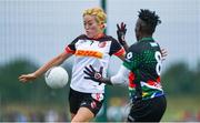 29 July 2019; Eunmi Jeong of Asia Cranes in action against Mervis Mkhize of South Africa in their Ladies Football Native Born tournament game during the Renault GAA World Games 2019 Day 1 at WIT Arena, Carriganore, Co. Waterford. Photo by Piaras Ó Mídheach/Sportsfile