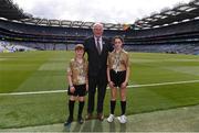 27 July 2019; Uachtarán Chumann Lúthchleas Gael John Horan with referees, Millie Keane, St Aidan's NS, Shannon, Co Clare, and Tadhg Fitzgerald, St Aidan's NS, Shannon, Co Clare, ahead of the INTO Cumann na mBunscol GAA Respect Exhibition Go Games at the GAA Hurling All-Ireland Senior Championship Semi-Final match between Limerick and Kilkenny at Croke Park in Dublin. Photo by Daire Brennan/Sportsfile