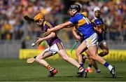 28 July 2019; Simon Donohoe of Wexford is tackled by Dan McCormack of Tipperary during the GAA Hurling All-Ireland Senior Championship Semi Final match between Wexford and Tipperary at Croke Park in Dublin. Photo by Brendan Moran/Sportsfile