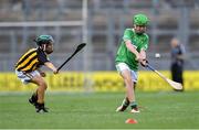 27 July 2019; Dylan McKeever, St. Patrick’s NS, Loch Gowna, Cavan, representing Limerick, in action against Cormac Simpson, Murrintown NS, Murrintown, Wexford, representing Kilkenny, during the INTO Cumann na mBunscol GAA Respect Exhibition Go Games at the GAA Hurling All-Ireland Senior Championship Semi-Final match between Limerick and Kilkenny at Croke Park in Dublin. Photo by Piaras Ó Mídheach/Sportsfile