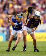 28 July 2019; Catríona McKinney, St Mura’s NS, Burnfoot, Donegal, representing Tipperary, in action against Molly Conroy, St Aidan’s NS, Kilmanagh , Kilkenny, representing Wexford, during the INTO Cumann na mBunscol GAA Respect Exhibition Go Games at the GAA Hurling All-Ireland Senior Championship Semi Final match between Wexford and Tipperary at Croke Park in Dublin. Photo by Ramsey Cardy/Sportsfile