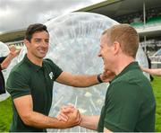 30 July 2019; Kerry footballer Aidan O'Mahony, left and former Galway hurler Ollie Canning following the Zorbing Derby on Day Two of the Galway Races Summer Festival 2019 in Ballybrit, Galway. Photo by Seb Daly/Sportsfile