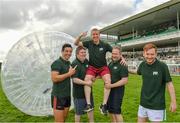 30 July 2019; Former Galway hurler Ollie Canning is held aloft by Kerry footballer Aidan O'Mahony, Off The Ball presenters John Duggan, Ger Gilroy, and Eoin Sheehan following the Zorbing Derby on Day Two of the Galway Races Summer Festival 2019 in Ballybrit, Galway. Photo by Seb Daly/Sportsfile