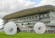 30 July 2019; Kerry footballer Aidan O'Mahony, left, and former Galway hurler Ollie Canning during the Zorbing Derby on Day Two of the Galway Races Summer Festival 2019 in Ballybrit, Galway. Photo by Seb Daly/Sportsfile