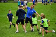 31 July 2019; Leinster players, Rory O’Loughlin and James Tracy with participants during the Bank of Ireland Leinster Rugby Summer Camp at Coolmine RFC in Castleknock, Dublin. Photo by Brendan Moran/Sportsfile