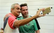 31 July 2019; Shamrock Rovers manager Stephen Bradley takes a selfie with local journalist Valentino Pierides of Provoli Sports during a Shamrock Rovers Press Conference at the GSP Stadium in Nicosia, Cyprus. Photo by Harry Murphy/Sportsfile