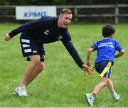 31 July 2019; Leinster player Rory O’Loughlin with participants during the Bank of Ireland Leinster Rugby Summer Camp at Coolmine RFC in Castleknock, Dublin. Photo by Brendan Moran/Sportsfile