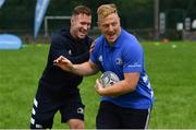 31 July 2019; Leinster players Rory O’Loughlin and James Tracy with participants during the Bank of Ireland Leinster Rugby Summer Camp at Coolmine RFC in Castleknock, Dublin. Photo by Brendan Moran/Sportsfile