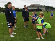 31 July 2019; Leinster players, Rory O’Loughlin and James Tracy with participants during the Bank of Ireland Leinster Rugby Summer Camp at Coolmine RFC in Castleknock, Dublin. Photo by Brendan Moran/Sportsfile