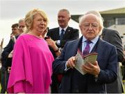 31 July 2019; President Michael D Higgins studies the form prior to the thetote.com Galway Plate Handicap Steeplechase on Day Three of the Galway Races Summer Festival 2019 in Ballybrit, Galway. Photo by Seb Daly/Sportsfile