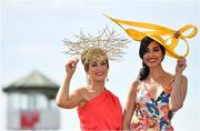 1 August 2019; Racegoers Rebecca Rose Quigley, from Clones, Monaghan, and Carlha Linares, from Colombia, pose for a photograph prior to racing on Day Four of the Galway Races Summer Festival 2019 in Ballybrit, Galway. Photo by Seb Daly/Sportsfile