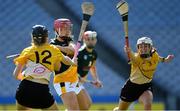 2 August 2019; Lisa Loughnane of Australasia in action against Emma Carroll, left, and Eimear Clarke of Middle East in the Renault GAA World Games Camogie Irish Cup Final during the Renault GAA World Games 2019 Day 5 - Cup Finals at Croke Park in Dublin. Photo by Piaras Ó Mídheach/Sportsfile