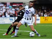 24 July 2019; Michael Duffy of Dundalk and Rahil Mammadov of Qarabag FK during the UEFA Champions League Second Qualifying Round 1st Leg match between Dundalk and Qarabag FK at Oriel Park in Dundalk, Louth. Photo by Ben McShane/Sportsfile