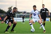 24 July 2019; Dane Massey of Dundalk and Simeon Slavchev of Qarabag FK during the UEFA Champions League Second Qualifying Round 1st Leg match between Dundalk and Qarabag FK at Oriel Park in Dundalk, Louth. Photo by Ben McShane/Sportsfile