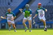 2 August 2019; Cian Kelly of Ireland, centre, in action against David Wogan, right, of Europe during a Hurling/Lacrosse Exhibition Game after the Renault GAA World Games 2019 Day 5 - Cup Finals at Croke Park in Dublin. Photo by Piaras Ó Mídheach/Sportsfile