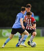 2 August 2019; Barry McNamee of Derry City in action against Jason McClelland, left, and Liam Kerrigan of UCD  during the SSE Airtricity League Premier Division match between UCD and Derry City at the UCD Bowl in Belfield, Dublin. Photo by Ramsey Cardy/Sportsfile