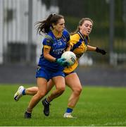 3 August 2019; Clodagh Lohan of Longford  in action against Rachel Mulligan of Roscommon during the All-Ireland Ladies Football Minor B Final match between Longford and Roscommon at Duggan Park in Ballinasloe, Galway. Photo by Ray McManus/Sportsfile