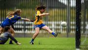 3 August 2019; Oonagh Kelly of Roscommon shoots past the Longford goalkeeper Riane McGrath and Ciara Sutton to score her side's second goal during the All-Ireland Ladies Football Minor B Final match between Longford and Roscommon at Duggan Park in Ballinasloe, Galway. Photo by Ray McManus/Sportsfile