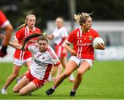 3 August 2019; Maire O'Callaghan of Cork in action against Maria Canavan of Tyrone  during the TG4 All-Ireland Ladies Football Senior Championship Quarter-Final match between Cork and Tyrone at Duggan Park in Ballinasloe, Galway. Photo by Ray McManus/Sportsfile