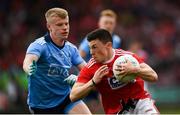 3 August 2019; Mark Cronin of Cork in action against Eoin O'Dea of Dublin  during the EirGrid GAA Football All-Ireland U20 Championship Final match between Cork and Dublin at O’Moore Park in Portlaoise, Laois. Photo by Harry Murphy/Sportsfile