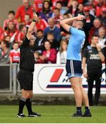 3 August 2019; Referee Derek O'Mahoney shows a black card to Peadar O Cofaigh Byrne of Dublin during the EirGrid GAA Football All-Ireland U20 Championship Final match between Cork and Dublin at O’Moore Park in Portlaoise, Laois. Photo by Matt Browne/Sportsfile