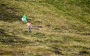 3 August 2019; Robert O’Donnell, from Pallasgreen, supporting Colin Ryan of Limerick, during the 2019 M. Donnelly GAA All-Ireland Poc Fada Finals at Annaverna Mountain in the Cooley Peninsula, Ravensdale, Co Louth. Photo by Piaras Ó Mídheach/Sportsfile