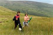 3 August 2019; Robert O’Donnell, from Pallasgreen, supporting Colin Ryan of Limerick, left, during the 2019 M. Donnelly GAA All-Ireland Poc Fada Finals at Annaverna Mountain in the Cooley Peninsula, Ravensdale, Co Louth. Photo by Piaras Ó Mídheach/Sportsfile