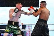 3 August 2019; Paddy Barnes, left, in action against Joel Sanchez during their bantamweight bout at Falls Park in Belfast. Photo by Ramsey Cardy/Sportsfile