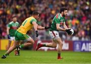 3 August 2019; Kevin McLoughlin of Mayo in action against Paul Brennan of Donegal during the GAA Football All-Ireland Senior Championship Quarter-Final Group 1 Phase 3 match between Mayo and Donegal at Elvery’s MacHale Park in Castlebar, Mayo. Photo by Daire Brennan/Sportsfile