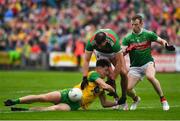 3 August 2019; Michael Langan of Donegal is tackled by Aidan O’Shea and Colm Boyle of Mayo during the GAA Football All-Ireland Senior Championship Quarter-Final Group 1 Phase 3 match between Mayo and Donegal at Elvery’s MacHale Park in Castlebar, Mayo. Photo by Brendan Moran/Sportsfile