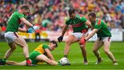 3 August 2019; Michael Langan of Donegal is tackled by Seamus O'Shea, Aidan O’Shea and Colm Boyle of Mayo during the GAA Football All-Ireland Senior Championship Quarter-Final Group 1 Phase 3 match between Mayo and Donegal at Elvery’s MacHale Park in Castlebar, Mayo. Photo by Brendan Moran/Sportsfile