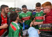 3 August 2019; Brendan Harrison, left, and James Carr of Mayo with supporters after the GAA Football All-Ireland Senior Championship Quarter-Final Group 1 Phase 3 match between Mayo and Donegal at Elvery’s MacHale Park in Castlebar, Mayo. Photo by Daire Brennan/Sportsfile