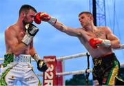 3 August 2019; Padraig McCrory, left, in action against Steve Collins Jr during their BUI Celtic Super-middleweight title bout  at Falls Park in Belfast. Photo by Ramsey Cardy/Sportsfile