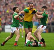 3 August 2019; Michael Murphy of Donegal is held by Chris Barrett and Eoin O'Donoghue of Mayo as Aidan O’Shea of Mayo lies injured holding his face during the GAA Football All-Ireland Senior Championship Quarter-Final Group 1 Phase 3 match between Mayo and Donegal at Elvery’s MacHale Park in Castlebar, Mayo. Photo by Brendan Moran/Sportsfile