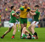 3 August 2019; Michael Murphy of Donegal is held by Chris Barrett and Eoin O'Donoghue of Mayo as Aidan O’Shea of Mayo lies injured holding his face during the GAA Football All-Ireland Senior Championship Quarter-Final Group 1 Phase 3 match between Mayo and Donegal at Elvery’s MacHale Park in Castlebar, Mayo. Photo by Brendan Moran/Sportsfile