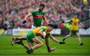 3 August 2019; Michael Langan of Donegal in action against Aidan O’Shea of Mayo during the GAA Football All-Ireland Senior Championship Quarter-Final Group 1 Phase 3 match between Mayo and Donegal at Elvery’s MacHale Park in Castlebar, Mayo. Photo by Brendan Moran/Sportsfile
