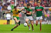 3 August 2019; Michael Langan of Donegal is tackled by Lee Keegan of Mayo during the GAA Football All-Ireland Senior Championship Quarter-Final Group 1 Phase 3 match between Mayo and Donegal at Elvery’s MacHale Park in Castlebar, Mayo. Photo by Brendan Moran/Sportsfile